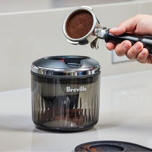 Breville Black and Silver “Puck Sucker”. Automatic Knock box